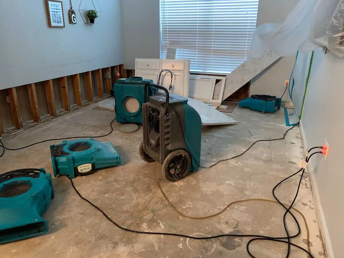 Dehumidifier in flood-cut room for Water Damage Restoration in Melrose Park
